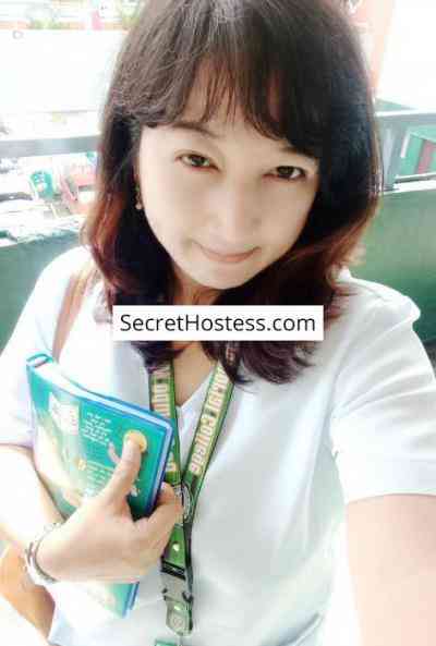 30 Year Old Asian Escort Manila Black Hair Brown eyes - Image 1