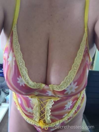 Mature elite stunner with huge natural boobs in Sydney