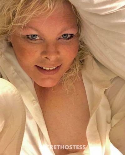 50 year old Escort in Milwaukee WI The Tall Blonde Bringing Sweet Heat