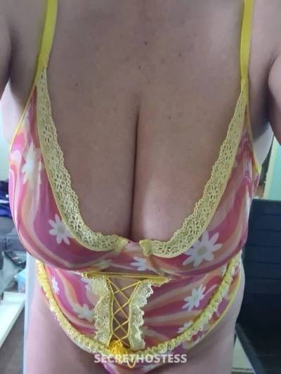 Elite mature, slim and very busty in Sydney