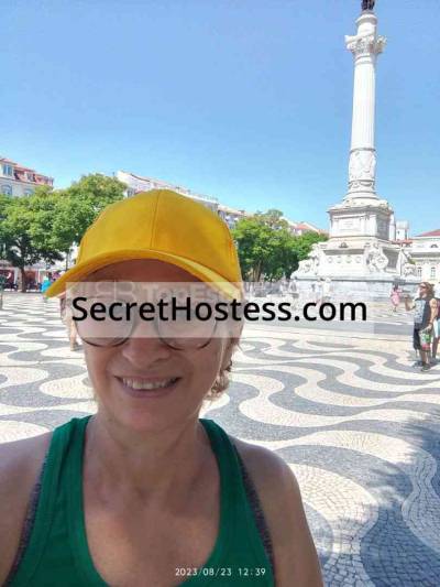 48 Year Old Andorran Escort Lisbon Blonde Green eyes - Image 1