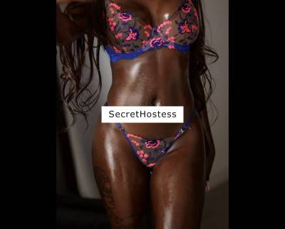 Enchanting dark-skinned young woman in Melbourne