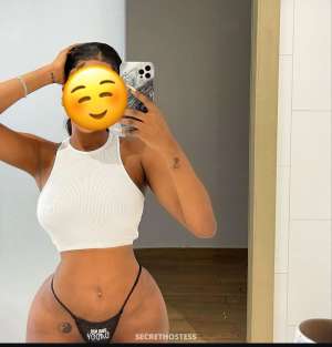 Divine, escort in Accra