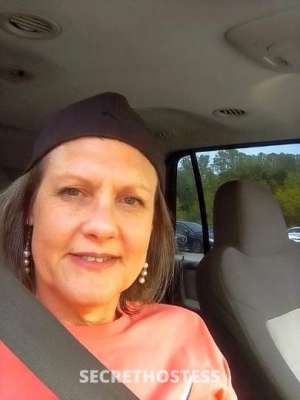 56 year old Escort in Greensboro NC Tall glass of southern water